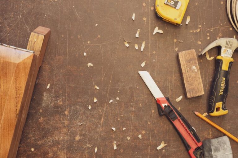 A collection of woodworking tools on a rustic workbench, showcasing craftsmanship in Mexico.